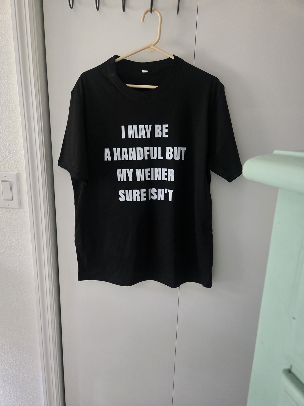 Black Graphic Men’s T‑Shirt with Bold White Text